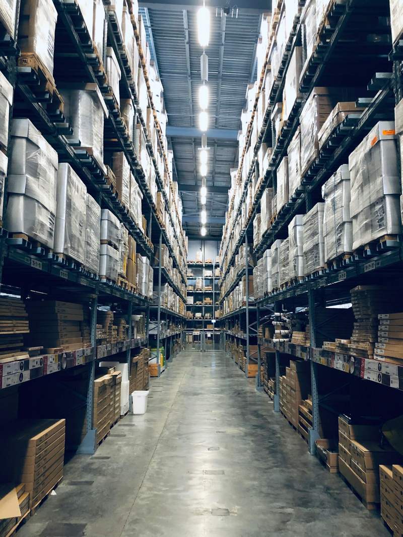 Labelled pallets with shipping marks in an NDL consolidation warehouse